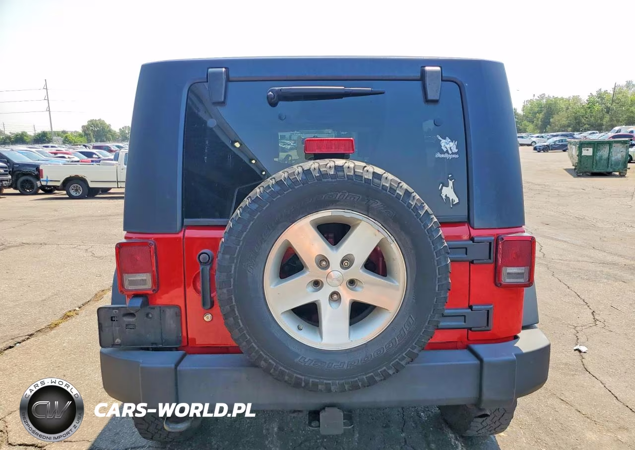 2009 Jeep Wrangler Unlimited Rubicon VIN:1J8GA691X9L765957 - 6