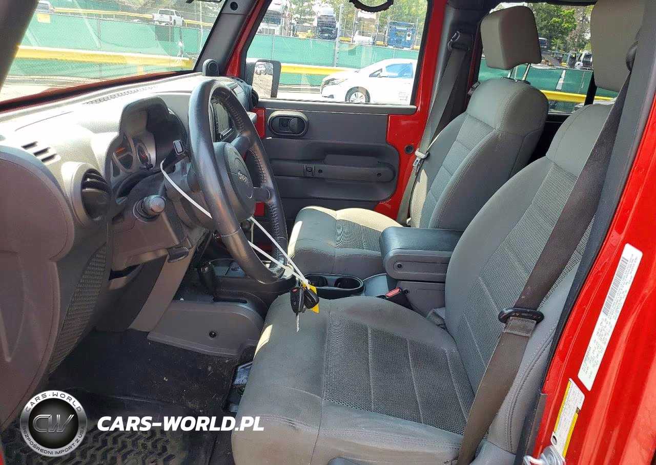 2009 Jeep Wrangler Unlimited Rubicon VIN:1J8GA691X9L765957 - 7