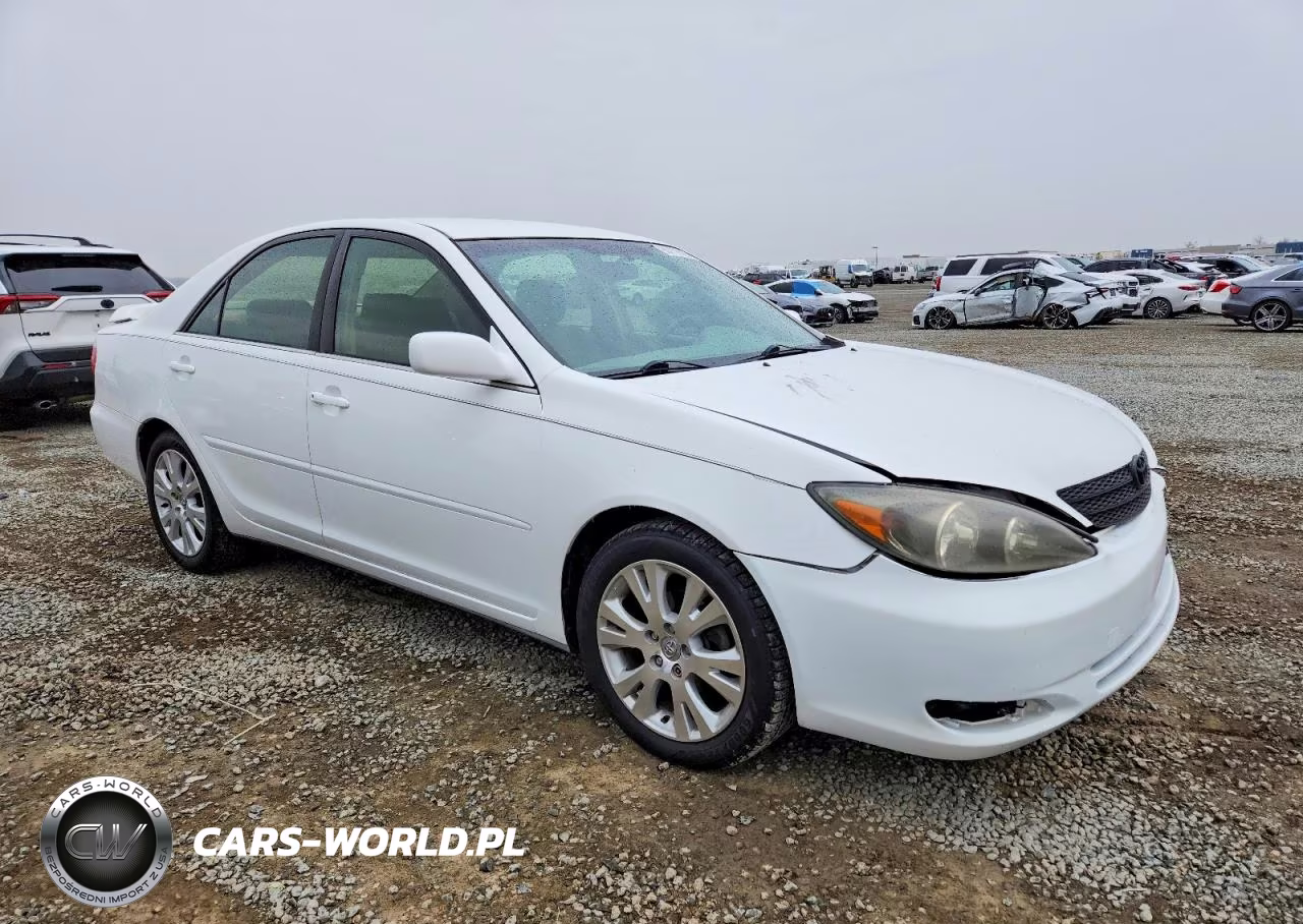2003 Toyota Camry Le VIN:JTDBE32K430222992 - 4