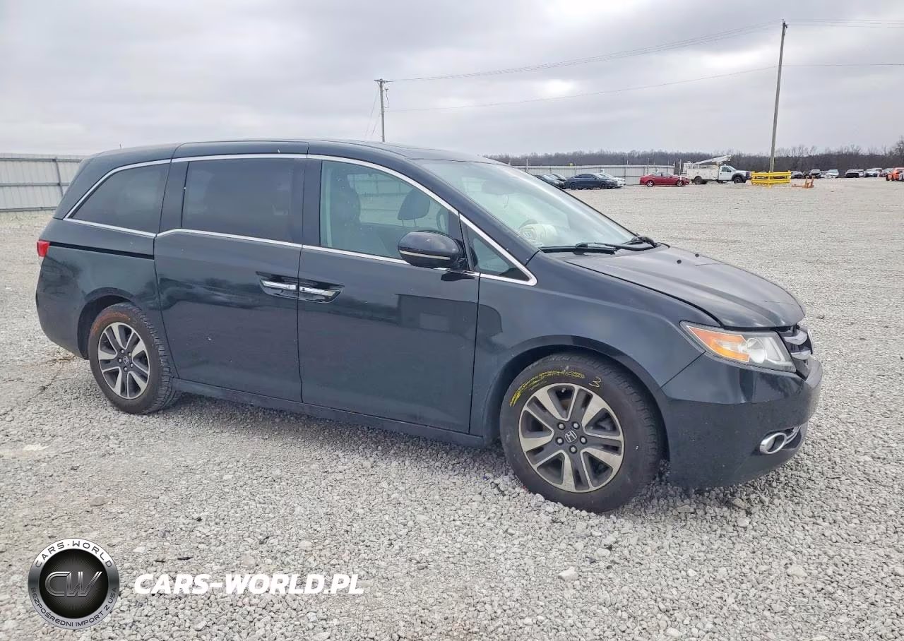 2016 Honda Odyssey Touring VIN:5FNRL5H9XGB061849 - 4