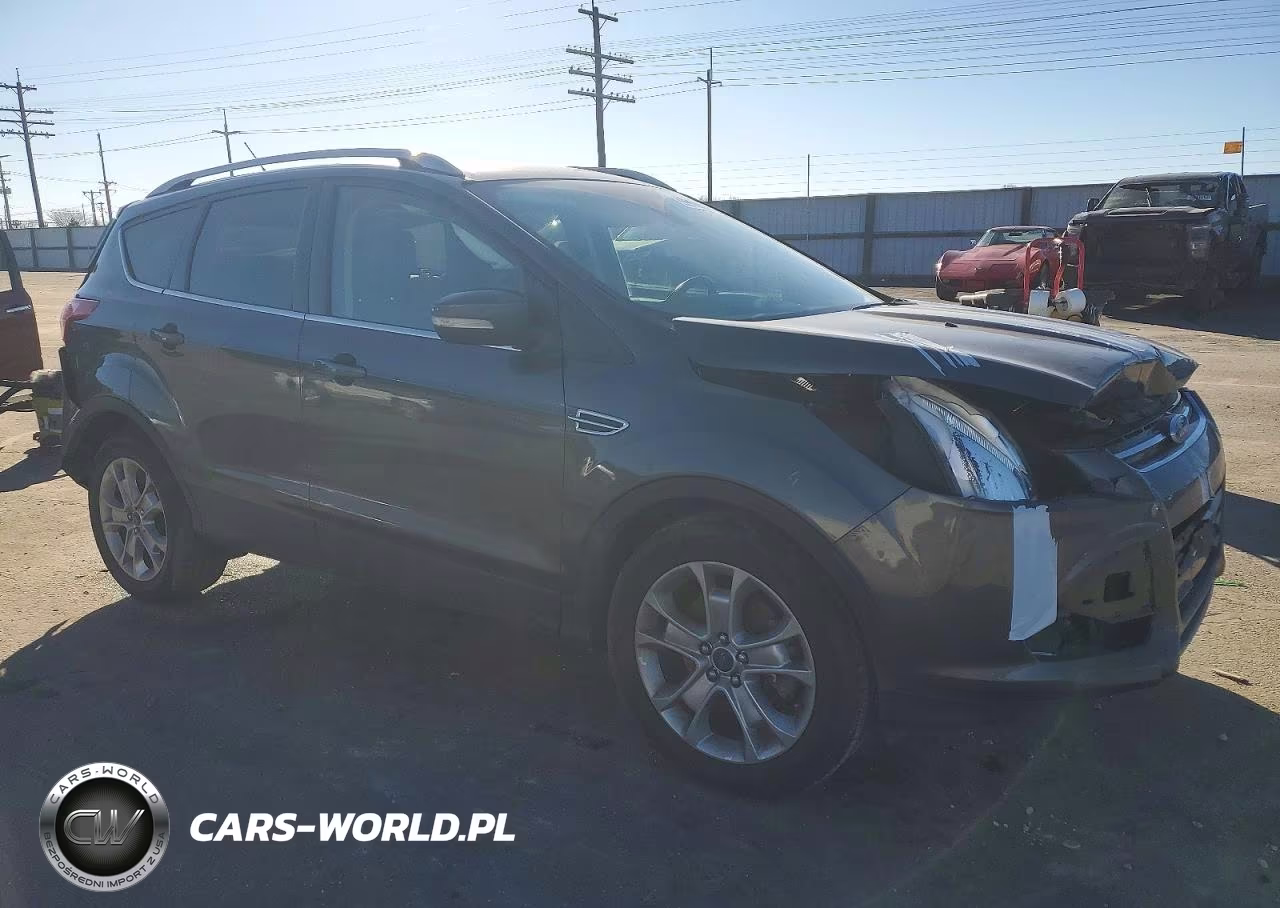 2015 Ford Escape Titanium VIN:1FMCU9J95FUB81337 - 4