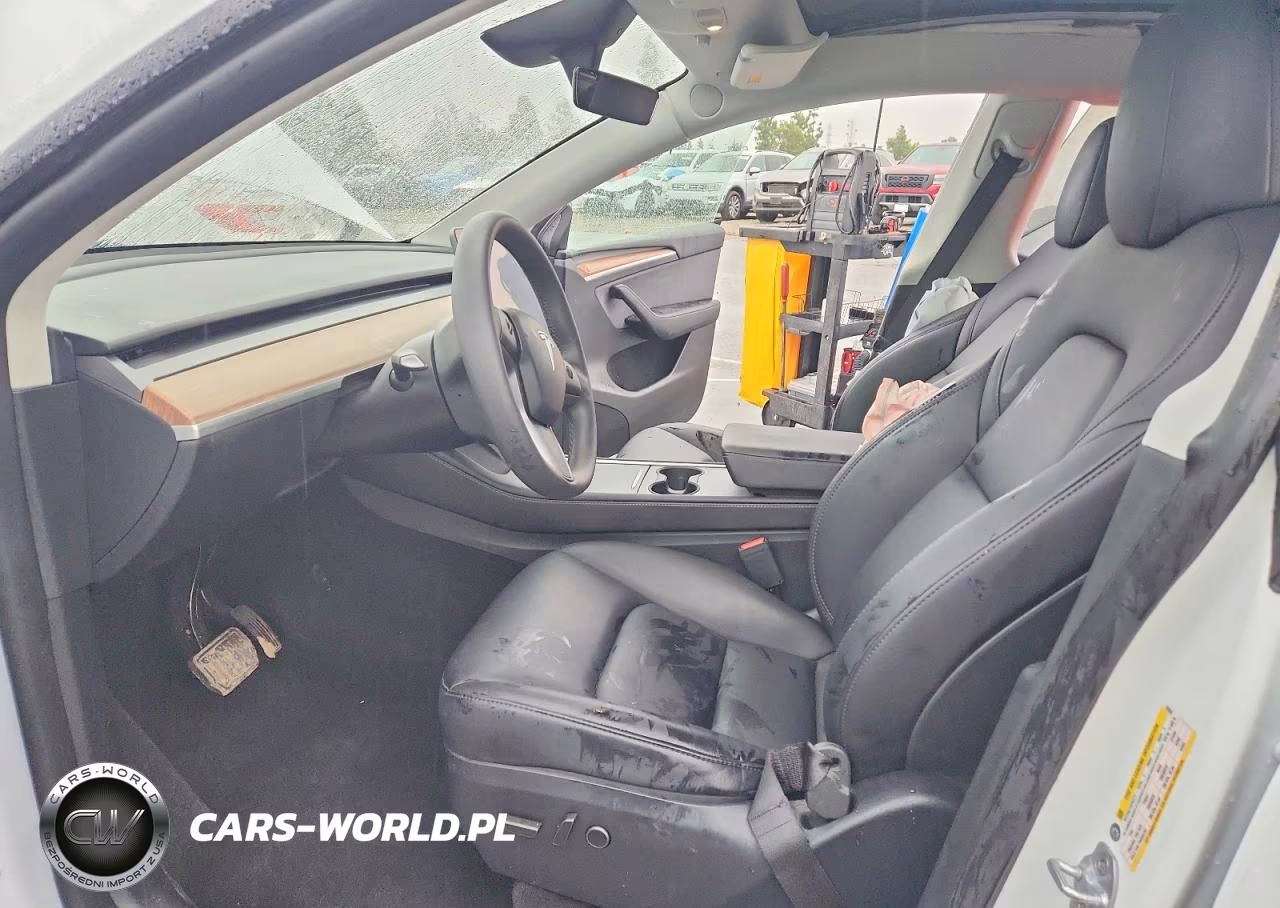 2024 Tesla Model Y VIN:7SAYGDEE8RF165337 - 7