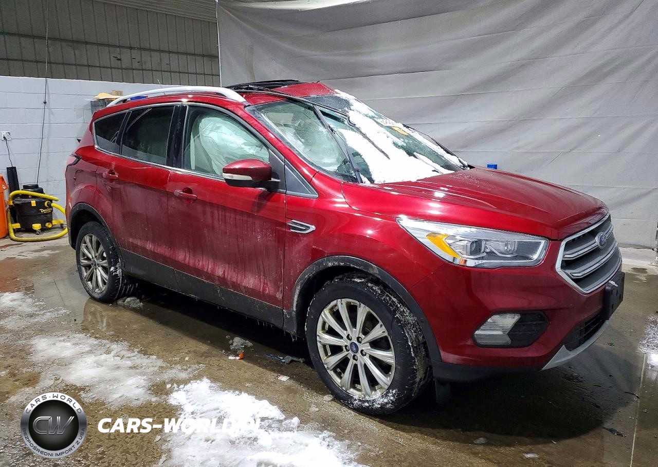 2017 Ford Escape Titanium VIN:1FMCU9J9XHUE27866 - 4