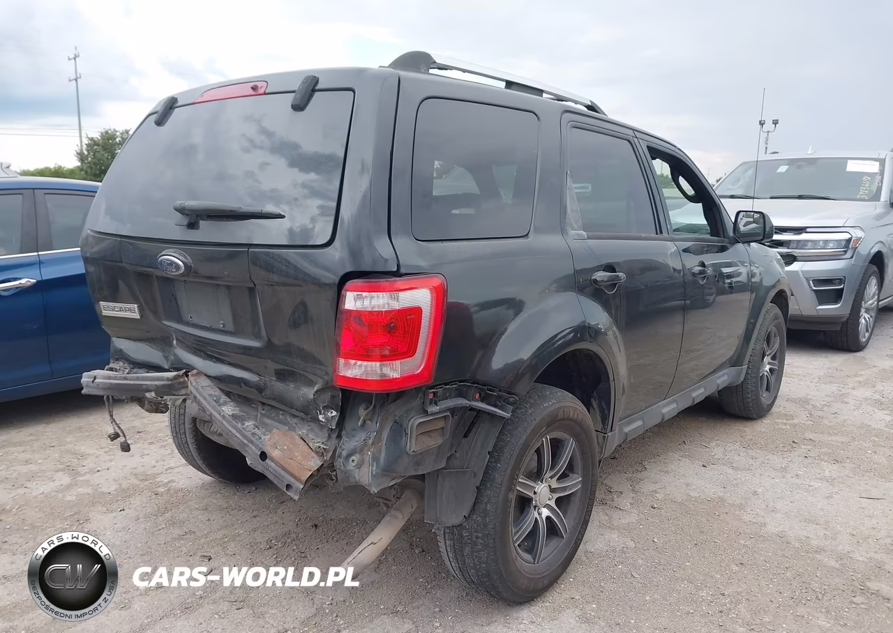 2010 Ford Escape Limited VIN:1FMCU9E76AKC59122 - 4