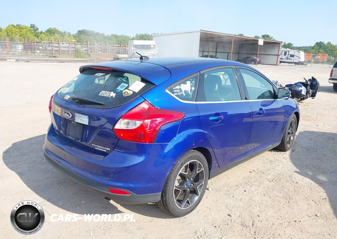 2012 Ford Focus Titanium VIN:1FAHP3N25CL444011 - 4