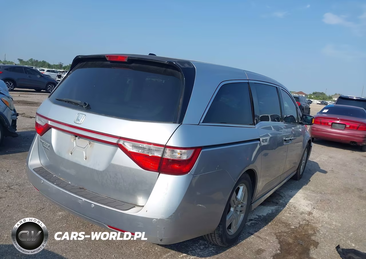 2012 Honda Odyssey Touring-Touring Elite VIN:5FNRL5H9XCB016243 - 4
