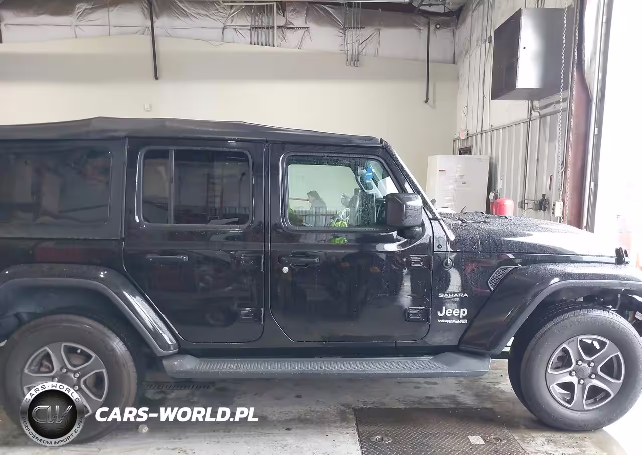 2019 Jeep Wrangler Unlimited Sahara 4X4 VIN:1C4HJXEG5KW528406 - 13