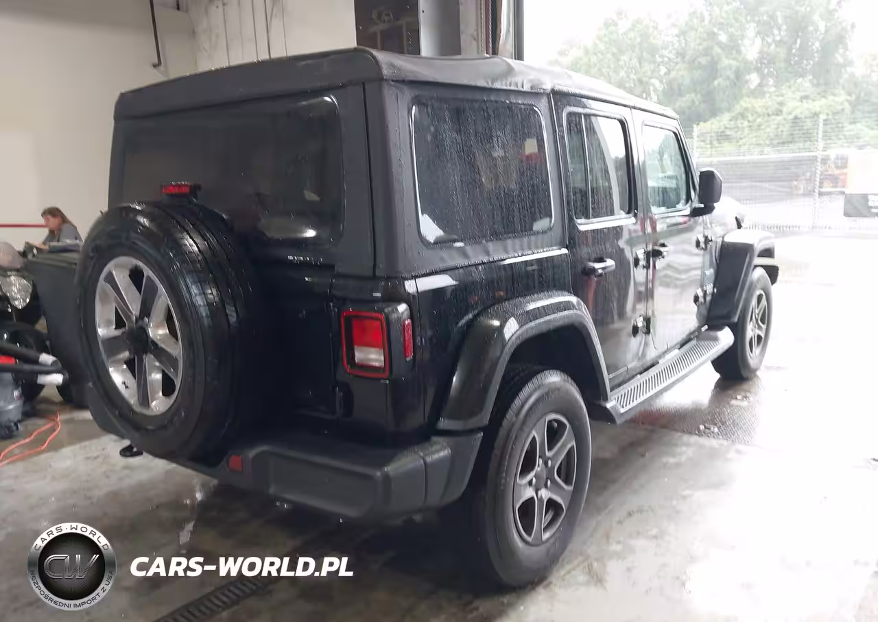 2019 Jeep Wrangler Unlimited Sahara 4X4 VIN:1C4HJXEG5KW528406 - 4