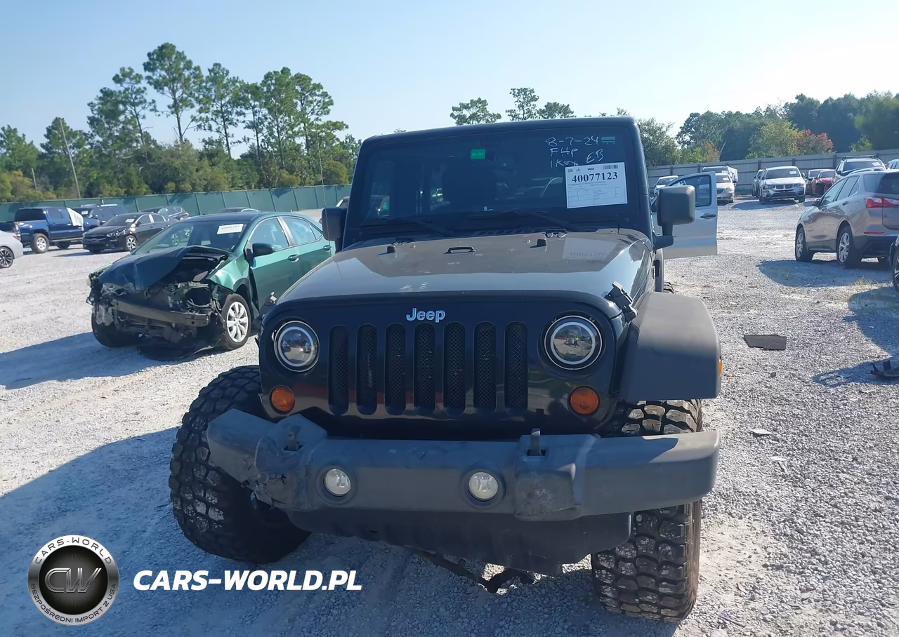 2013 Jeep Wrangler Unlimited Sport VIN:1C4HJWDG5DL668455 - 12