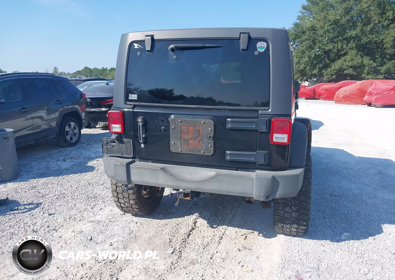 2013 Jeep Wrangler Unlimited Sport VIN:1C4HJWDG5DL668455 - 16