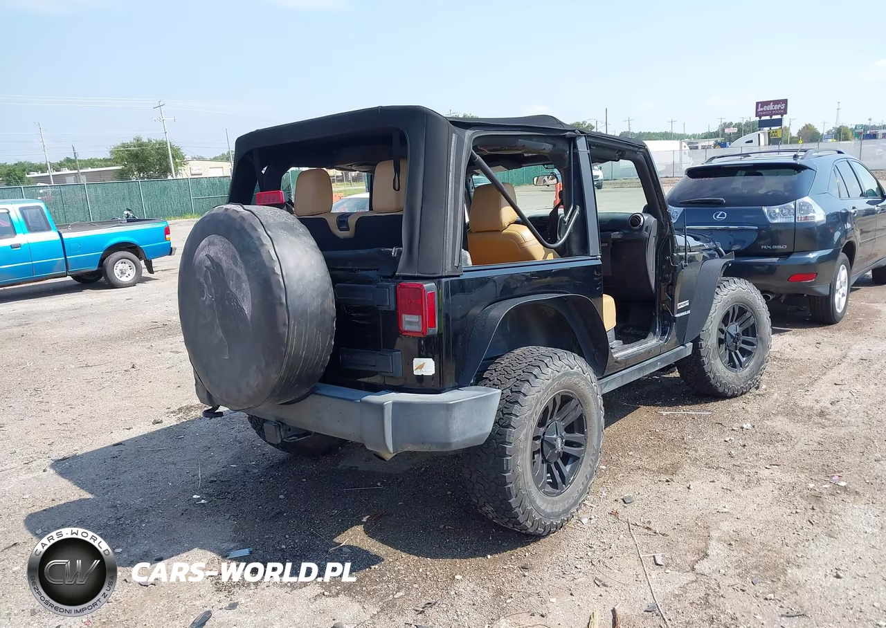 2013 Jeep Wrangler Sport VIN:1C4AJWAG7DL673369 - 4