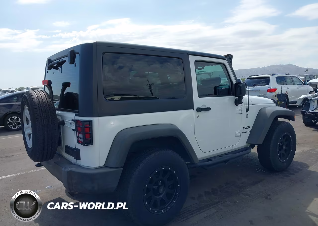 2014 Jeep Wrangler Sport VIN:1C4AJWAGXEL258385 - 4