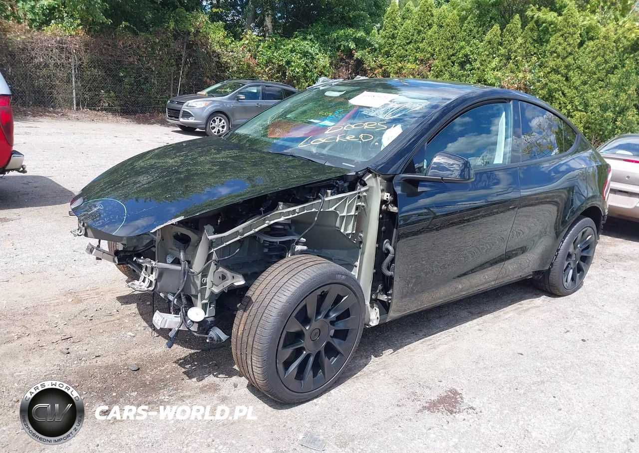 2023 Tesla Model Y Awd-Long Range Dual Motor All-Wheel Drive VIN:7SAYGDEE5PA166861 - 2