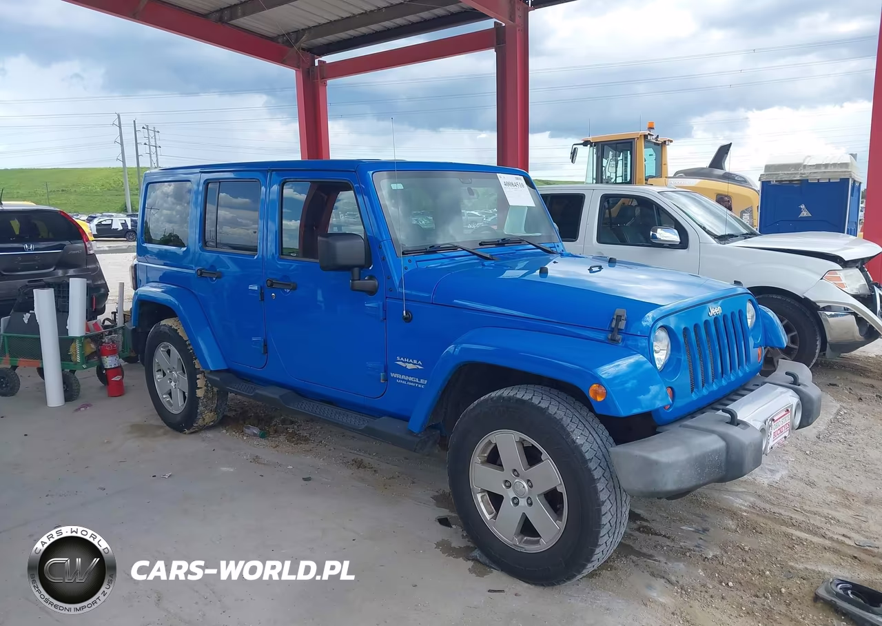 2011 Jeep Wrangler Unlimited Sahara VIN:1J4BA5H11BL548861 - 14