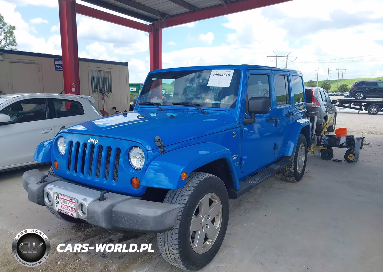 2011 Jeep Wrangler Unlimited Sahara VIN:1J4BA5H11BL548861 - 2