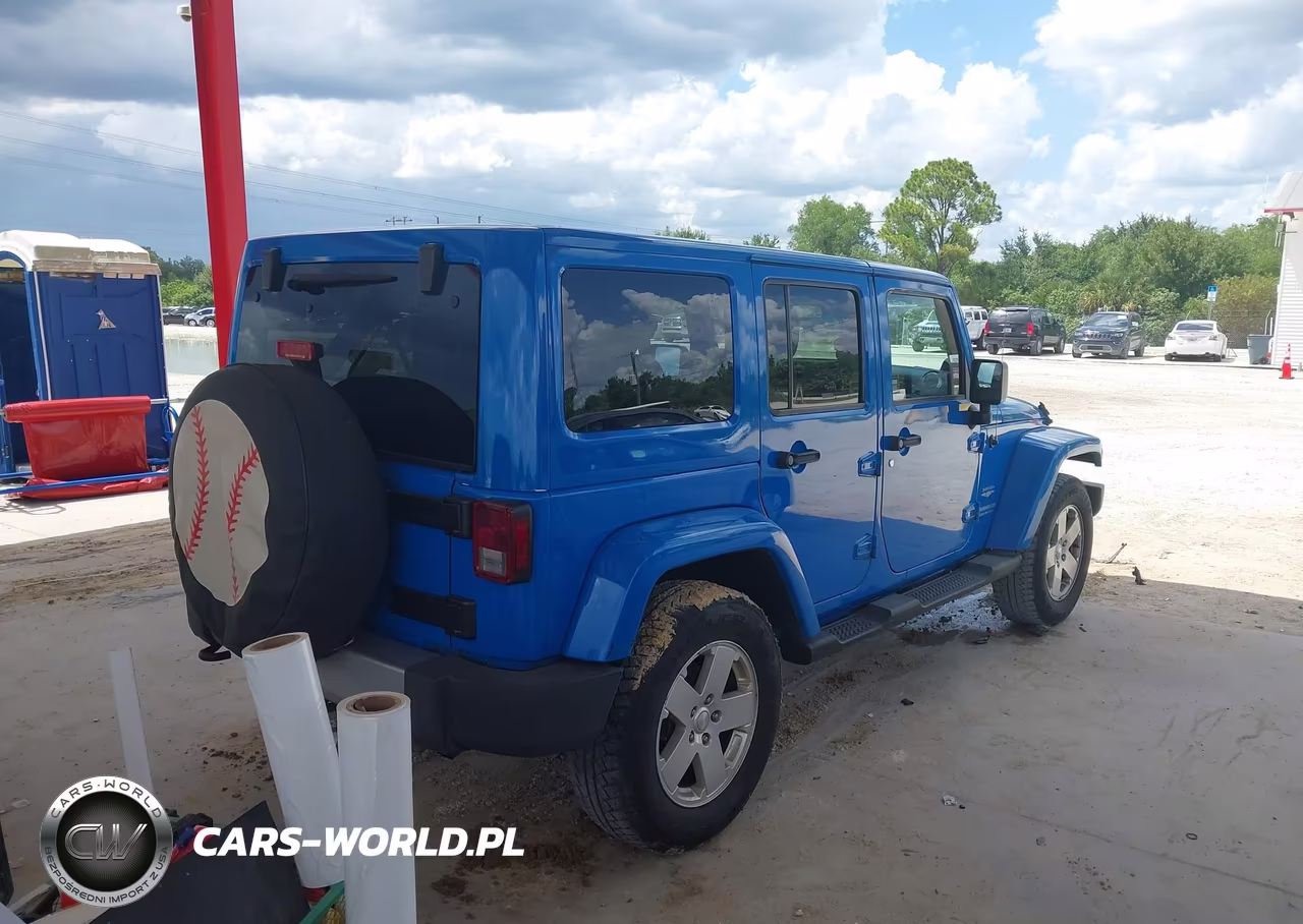 2011 Jeep Wrangler Unlimited Sahara VIN:1J4BA5H11BL548861 - 4
