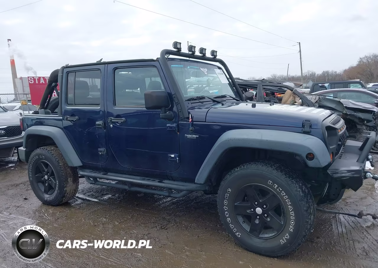 2013 Jeep Wrangler Unlimited Sport VIN:1C4BJWDG5DL524569 - 13