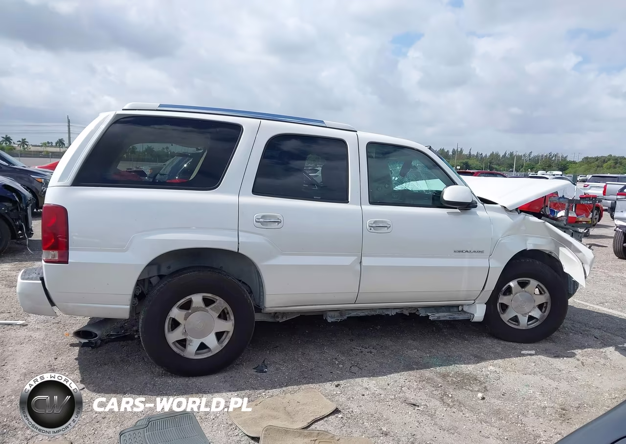 2002 Cadillac Escalade Standard VIN:1GYEC63T42R183580 - 13