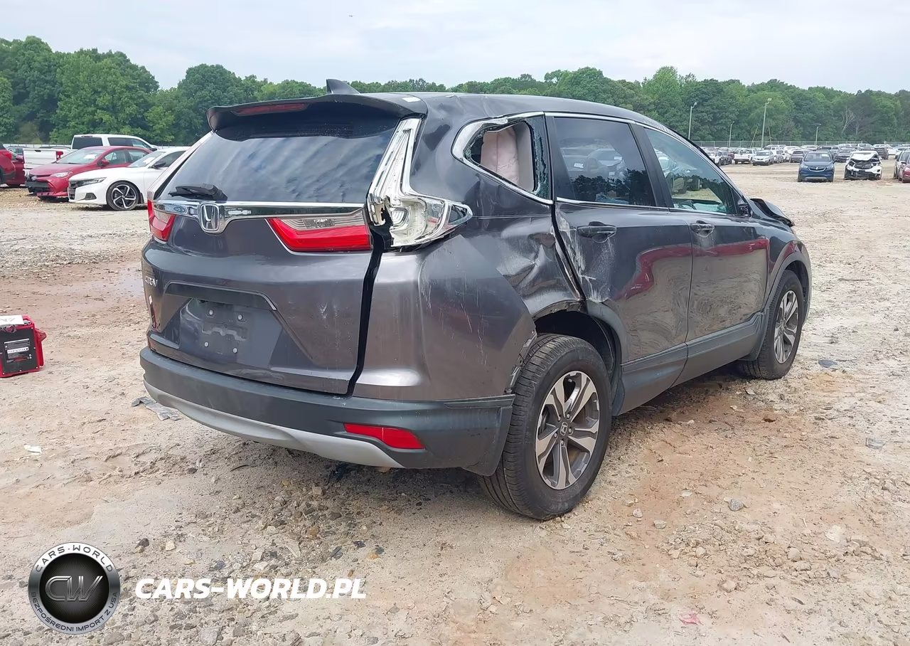 2017 Honda Cr-V Lx VIN:7FARW5H33HE002117 - 4