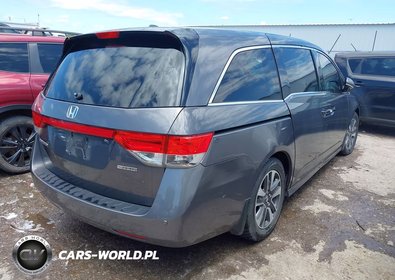 2014 Honda Odyssey Touring-Touring Elite VIN:5FNRL5H95EB020302 - 4