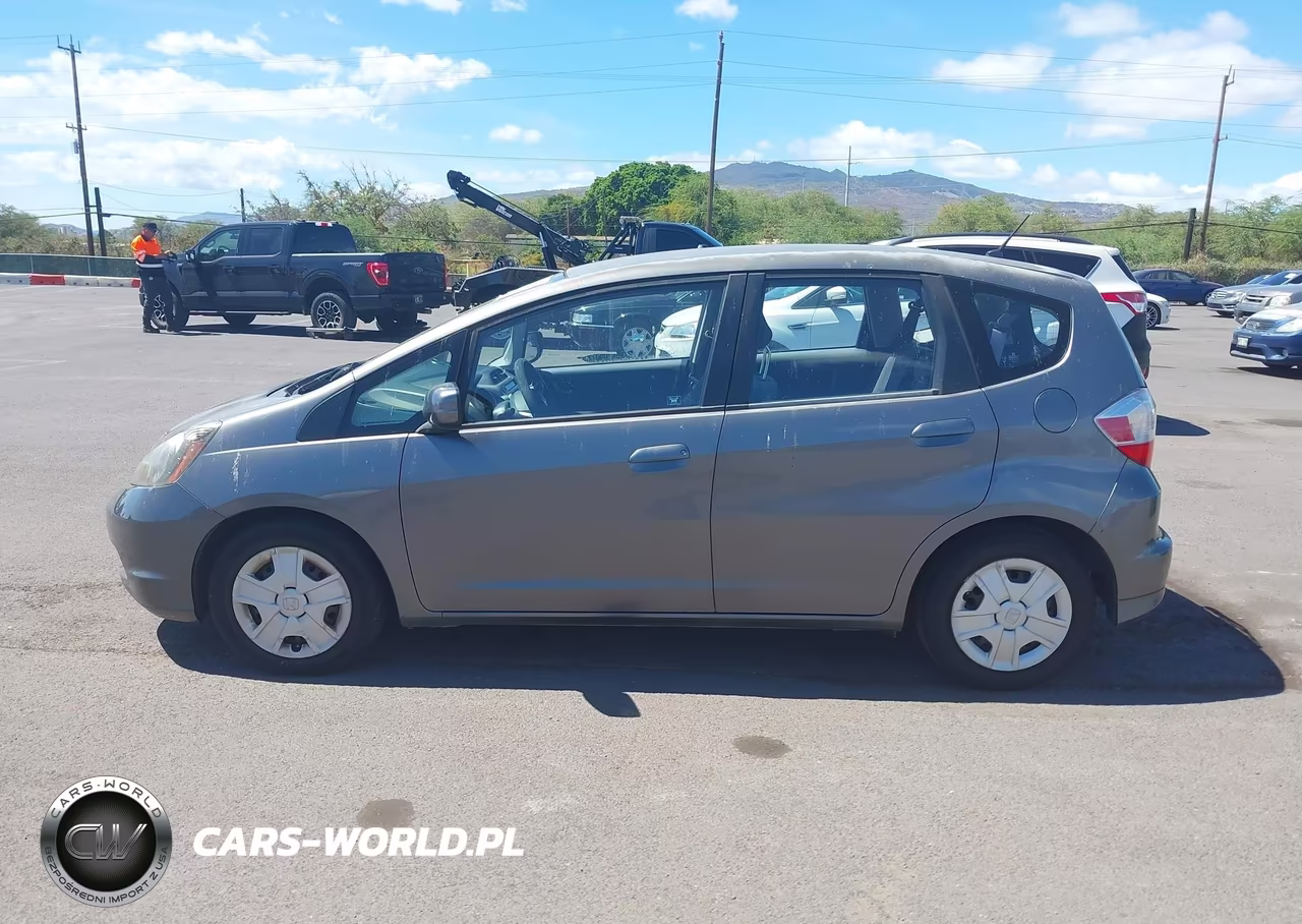 2013 Honda Fit VIN:JHMGE8H31DC060174 - 14