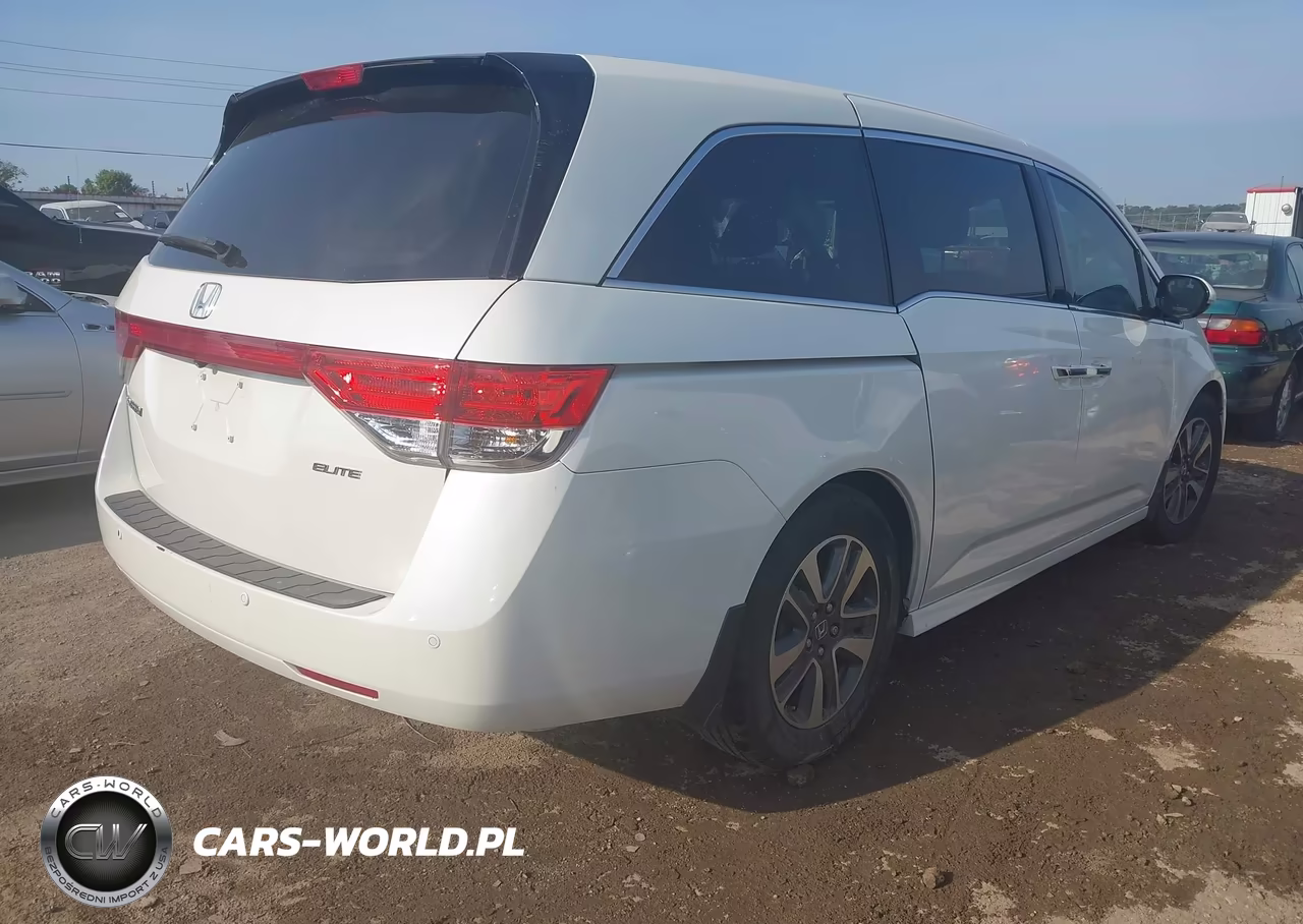 2016 Honda Odyssey Touring-Touring Elite VIN:5FNRL5H90GB106748 - 4