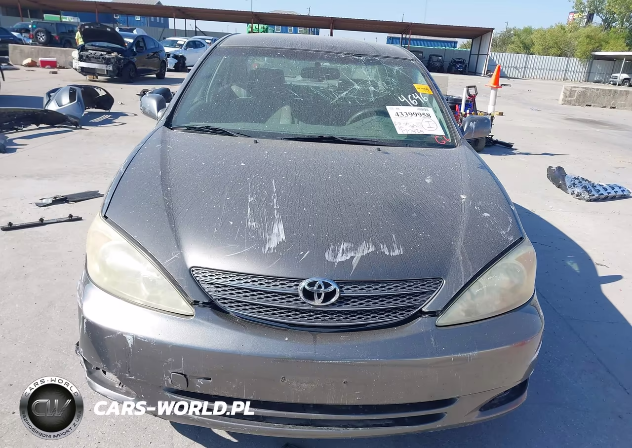 2002 Toyota Camry Le VIN:JTDBE32KX20119378 - 12