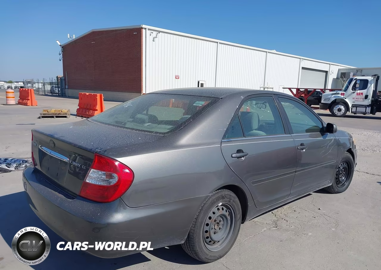 2002 Toyota Camry Le VIN:JTDBE32KX20119378 - 4