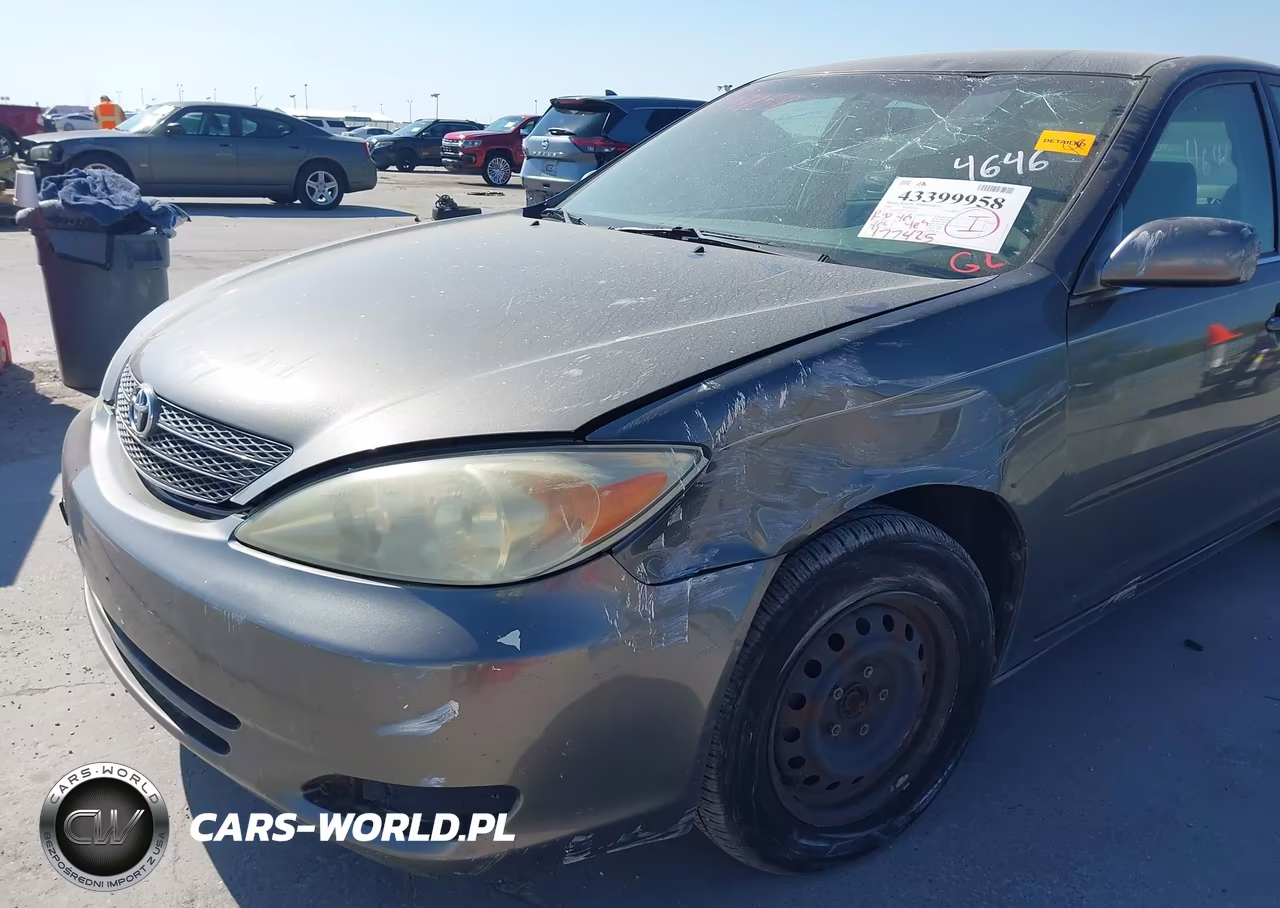 2002 Toyota Camry Le VIN:JTDBE32KX20119378 - 6