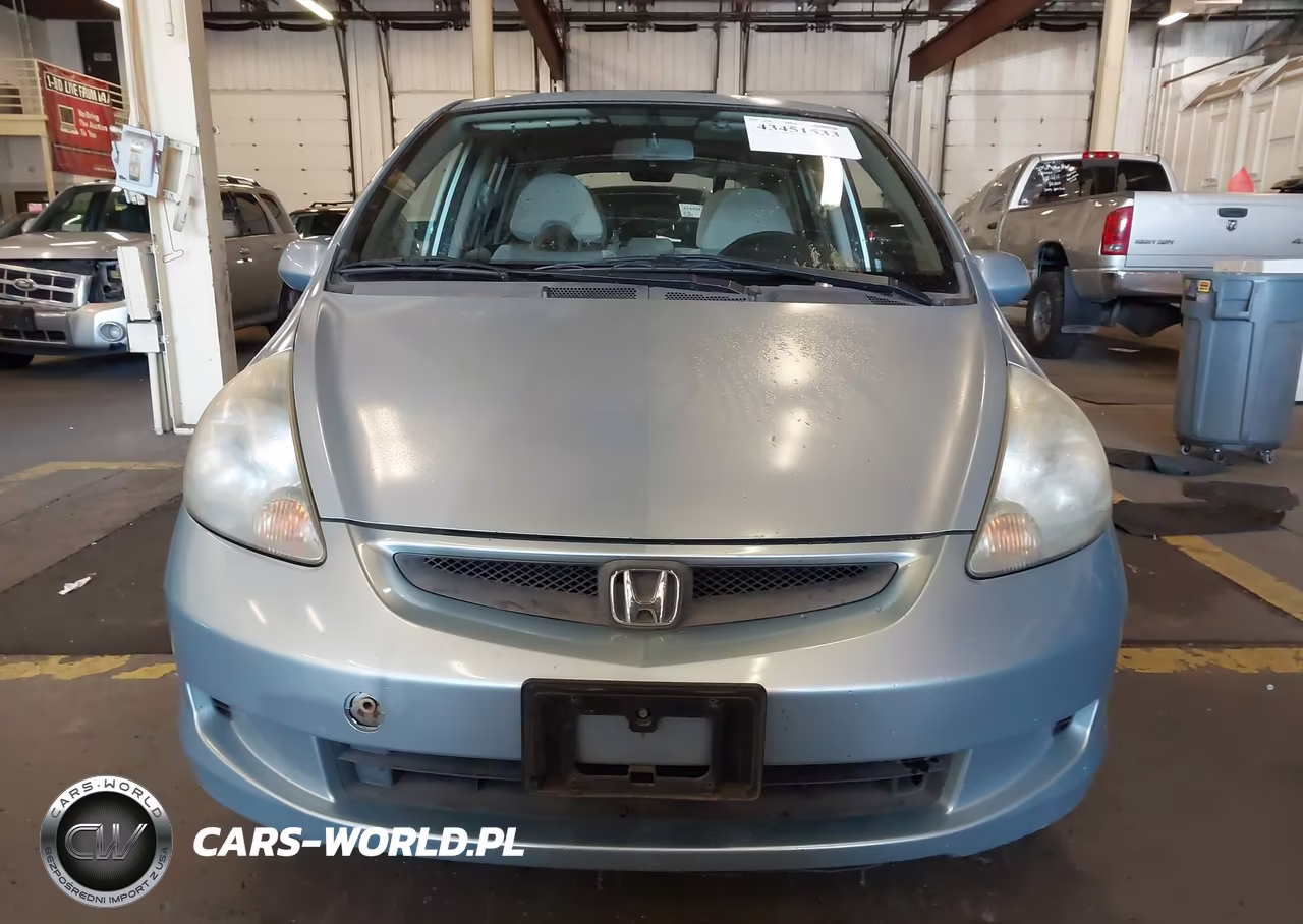 2007 Honda Fit VIN:JHMGD38497S053644 - 12