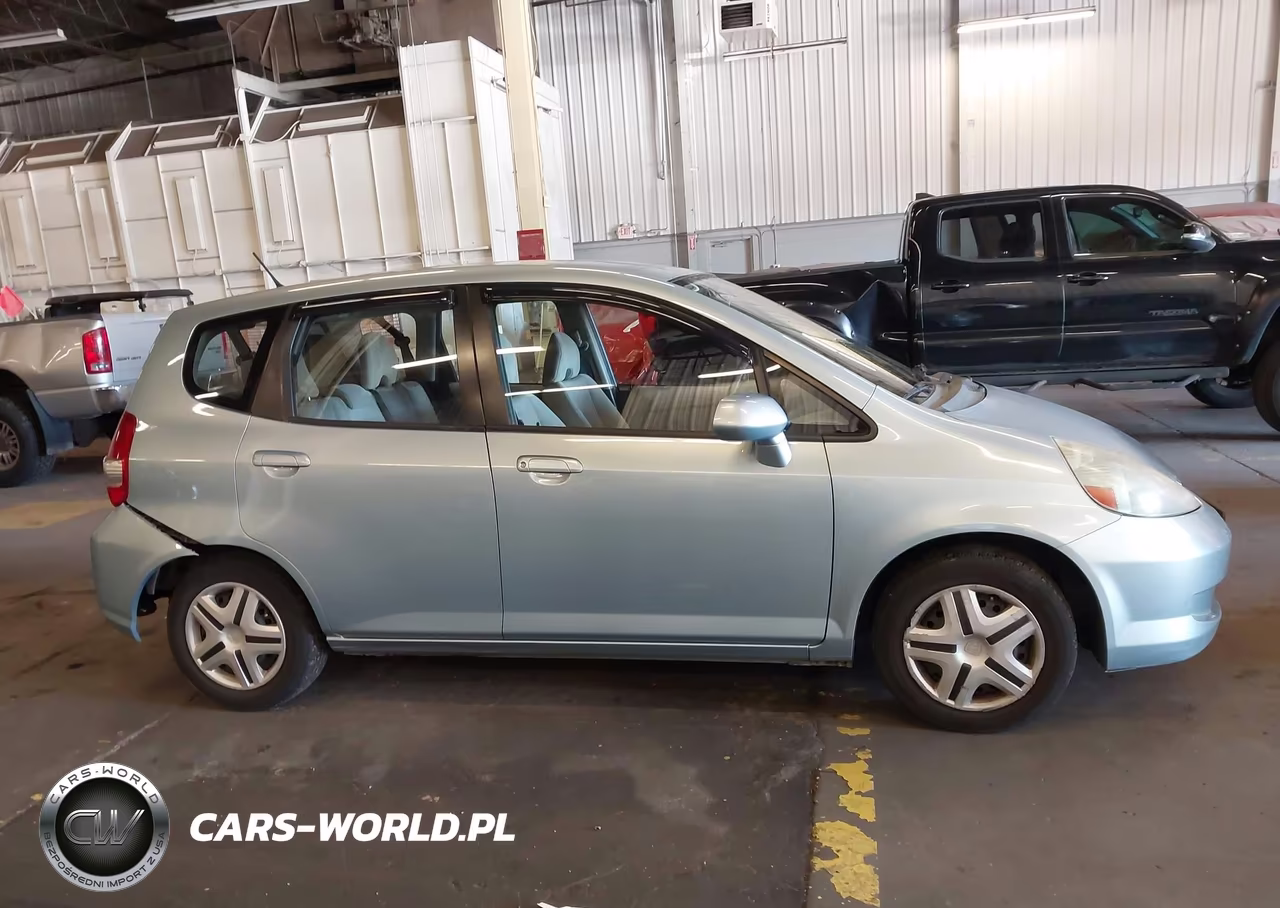 2007 Honda Fit VIN:JHMGD38497S053644 - 13