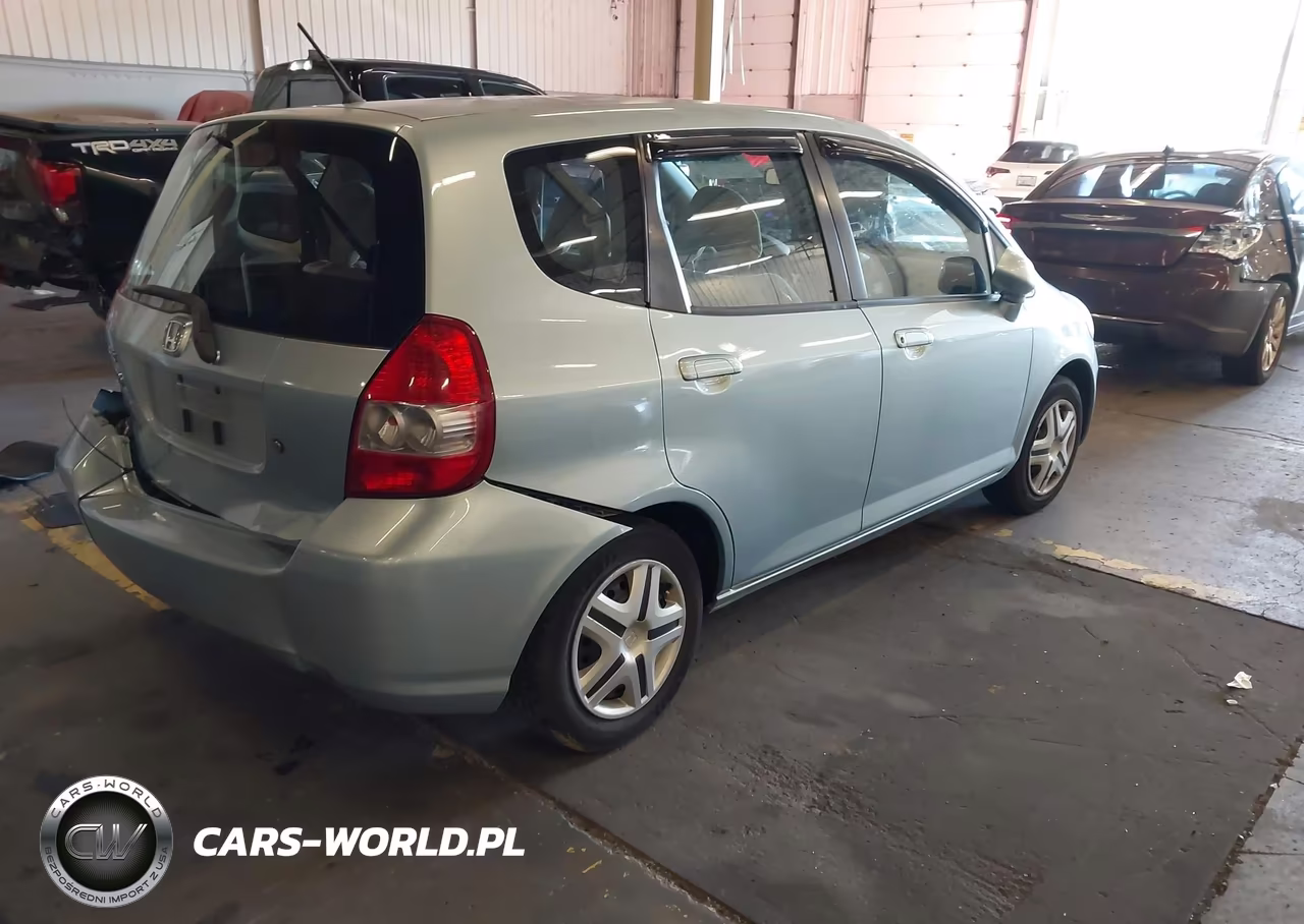 2007 Honda Fit VIN:JHMGD38497S053644 - 4