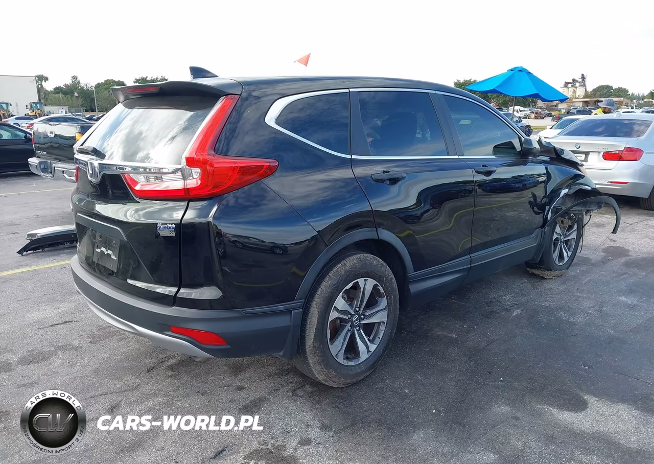 2017 Honda Cr-V Lx VIN:7FARW5H33HE013392 - 4