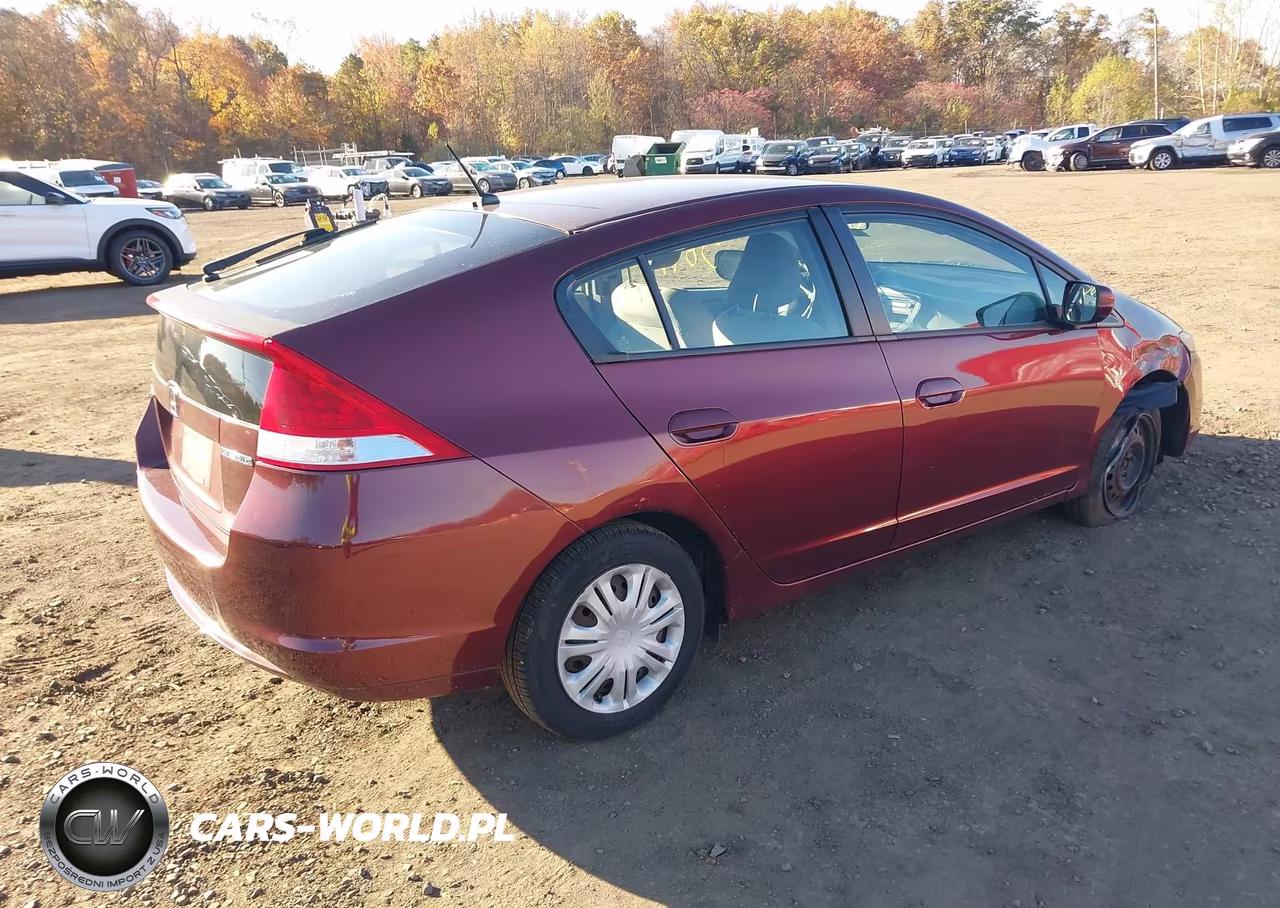 2011 Honda Insight VIN:JHMZE2H38BS007335 - 4