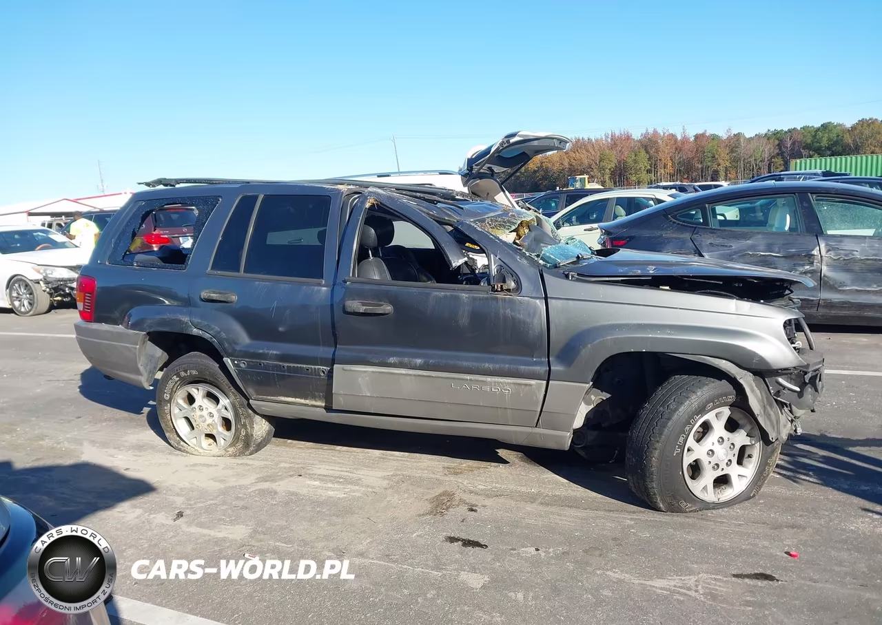 2002 Jeep Grand Cherokee Sport VIN:1J4GW38S72C253509 - 13
