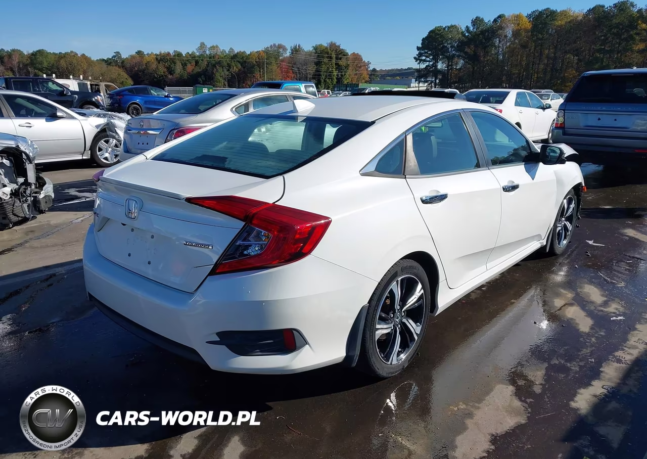 2017 Honda Civic Touring VIN:2HGFC1F97HH638929 - 4