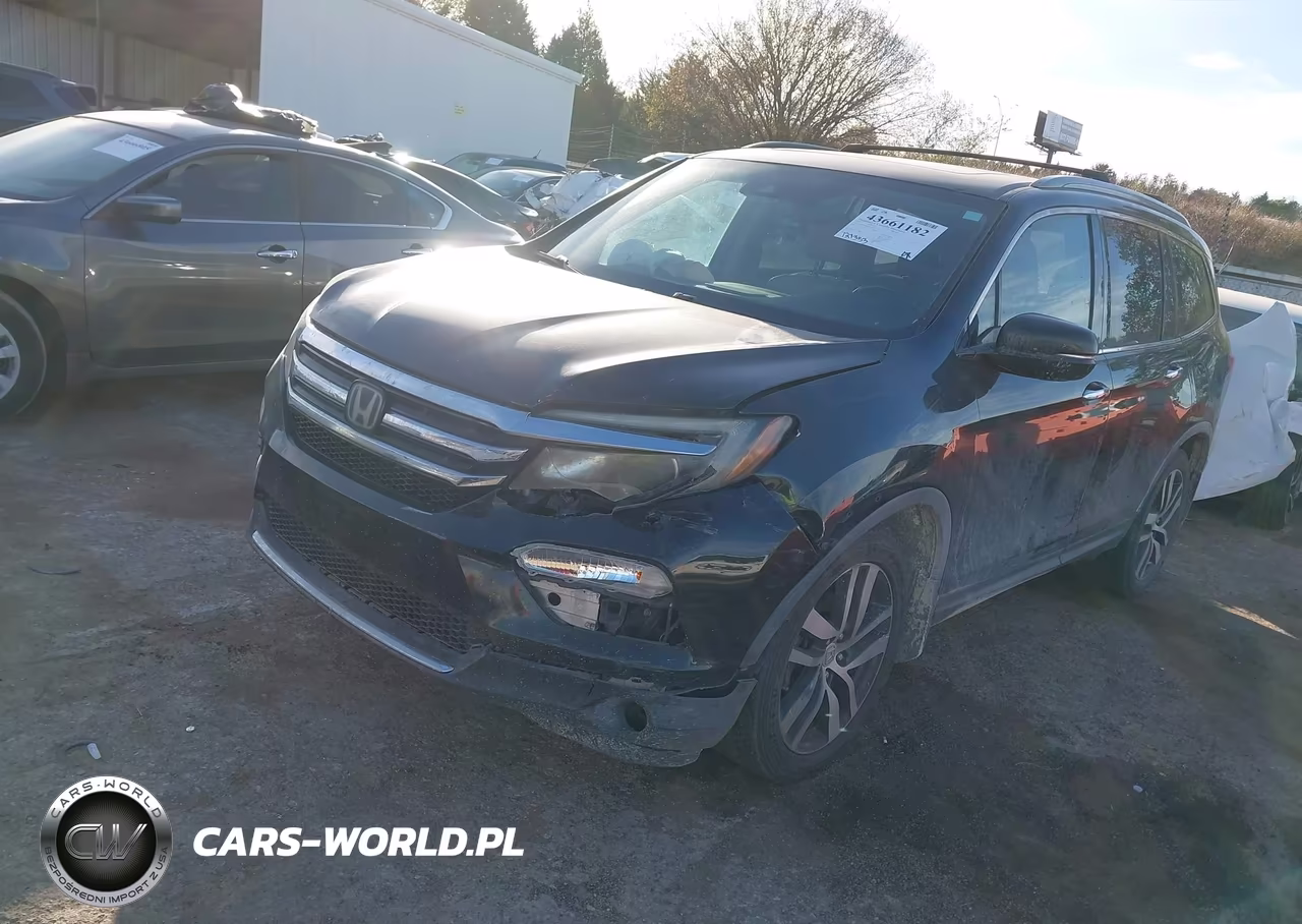 2017 Honda Pilot Touring VIN:5FNYF5H99HB034243 - 2