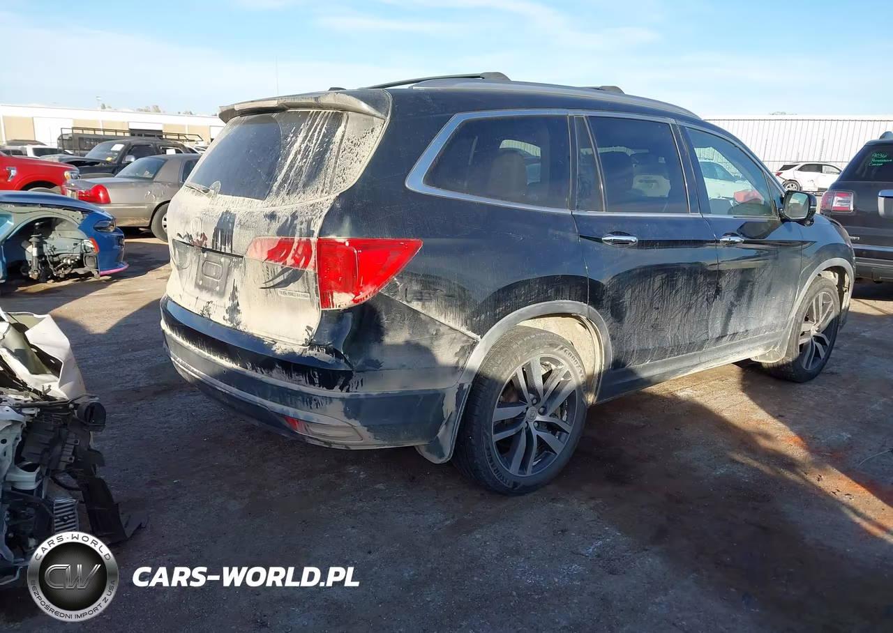 2017 Honda Pilot Touring VIN:5FNYF5H99HB034243 - 4