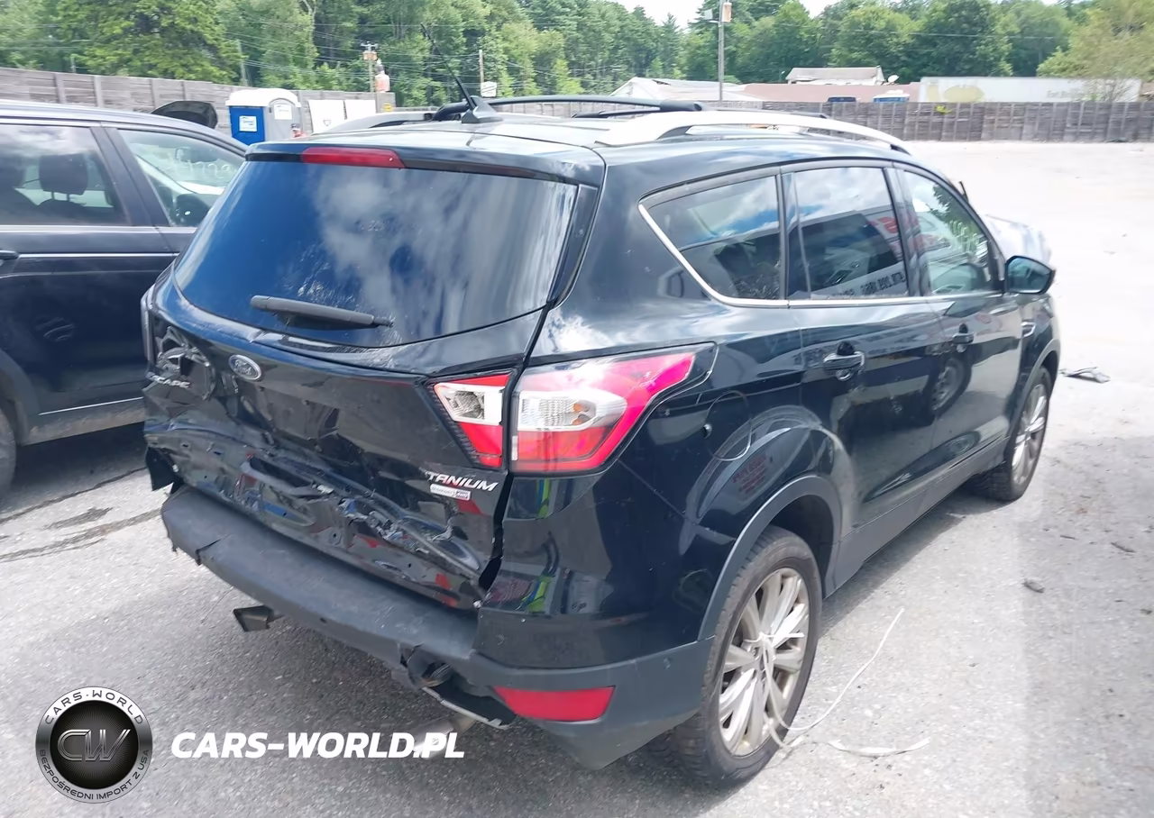 2018 Ford Escape Titanium VIN:1FMCU9J94JUB92497 - 4