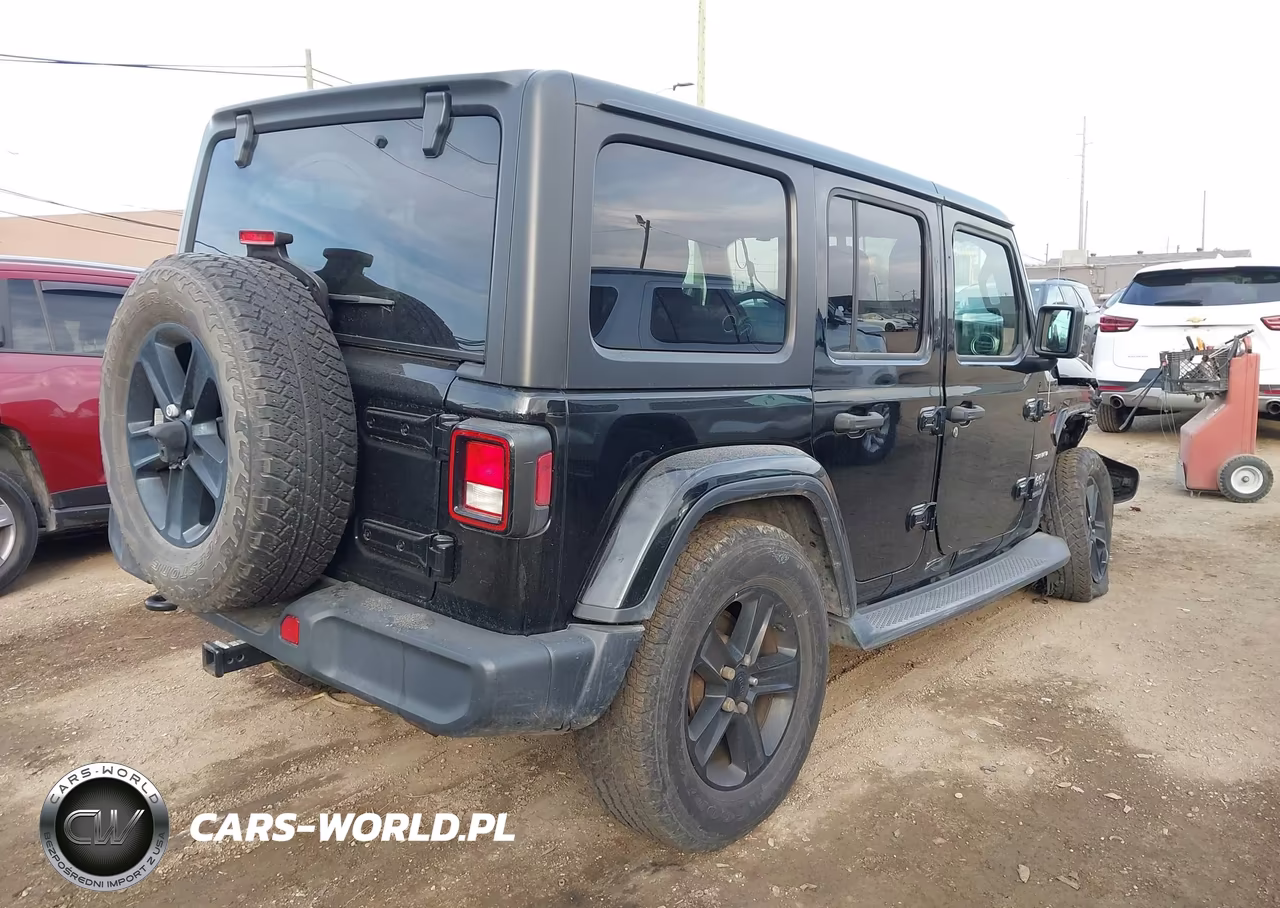 2019 Jeep Wrangler Unlimited Sahara 4X4 VIN:1C4HJXEN1KW620093 - 4