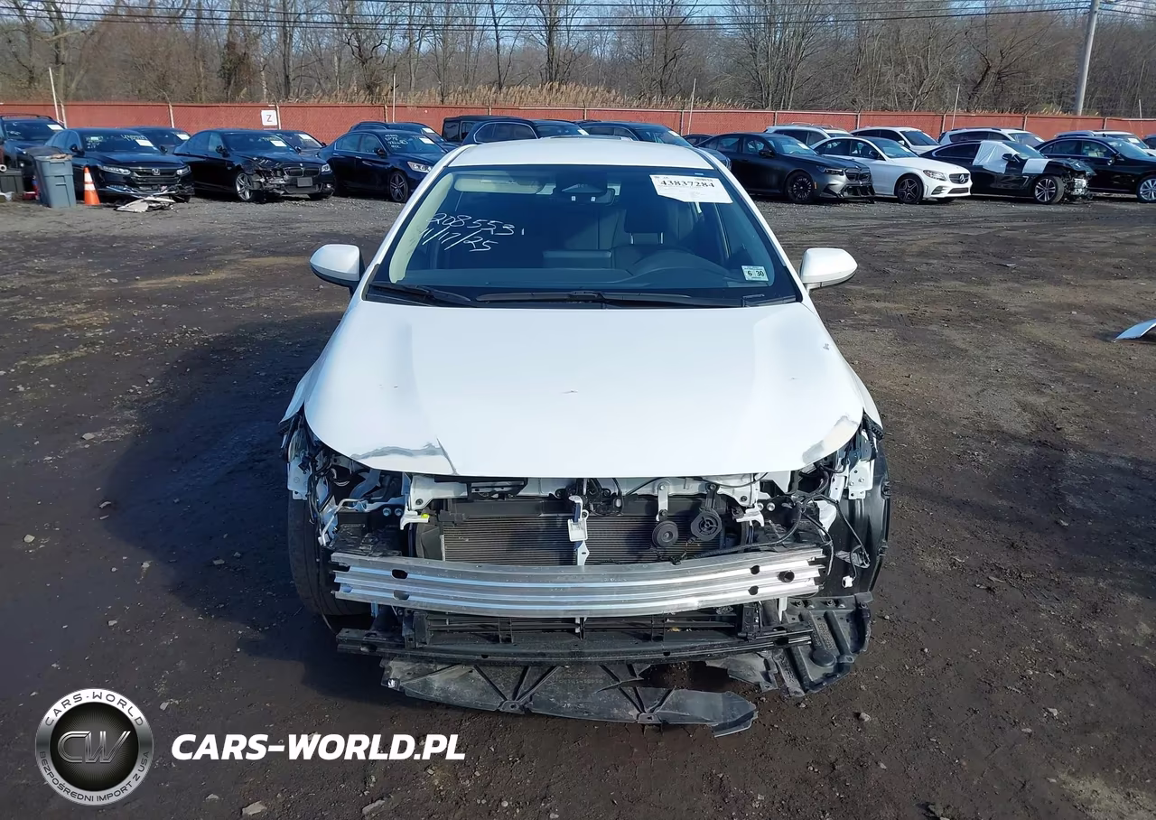 2025 Toyota Corolla Hybrid Le VIN:JTDBCMFE1S3070988 - 12