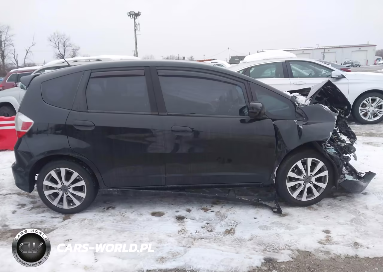 2012 Honda Fit Sport VIN:JHMGE8H58CC019296 - 14