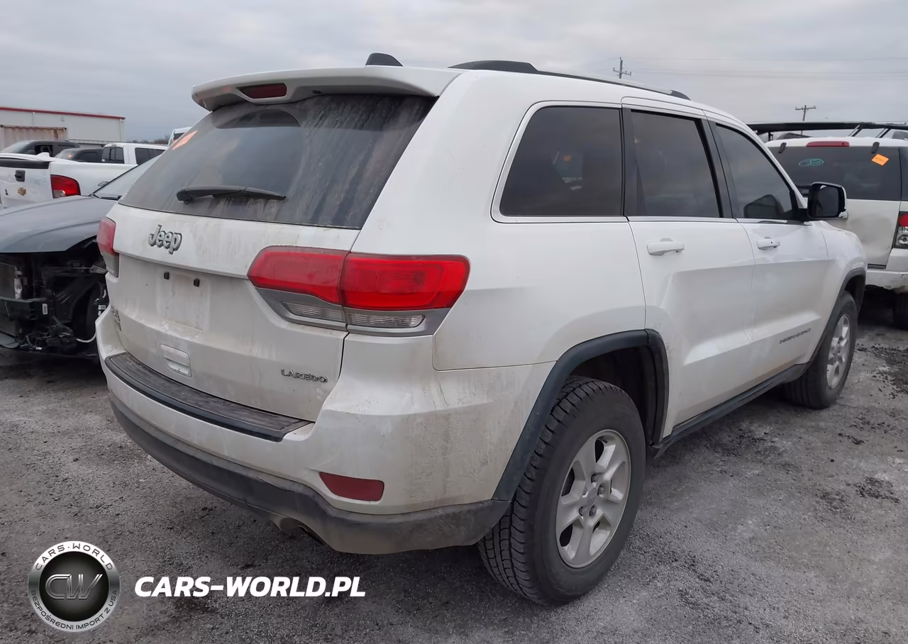 2015 Jeep Grand Cherokee Laredo VIN:1C4RJFAGXFC204928 - 4