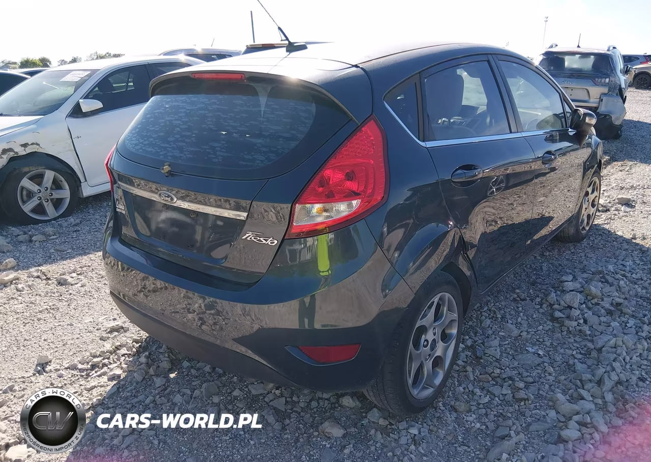 2011 Ford Fiesta Ses VIN:3FADP4FJ0BM204842 - 4