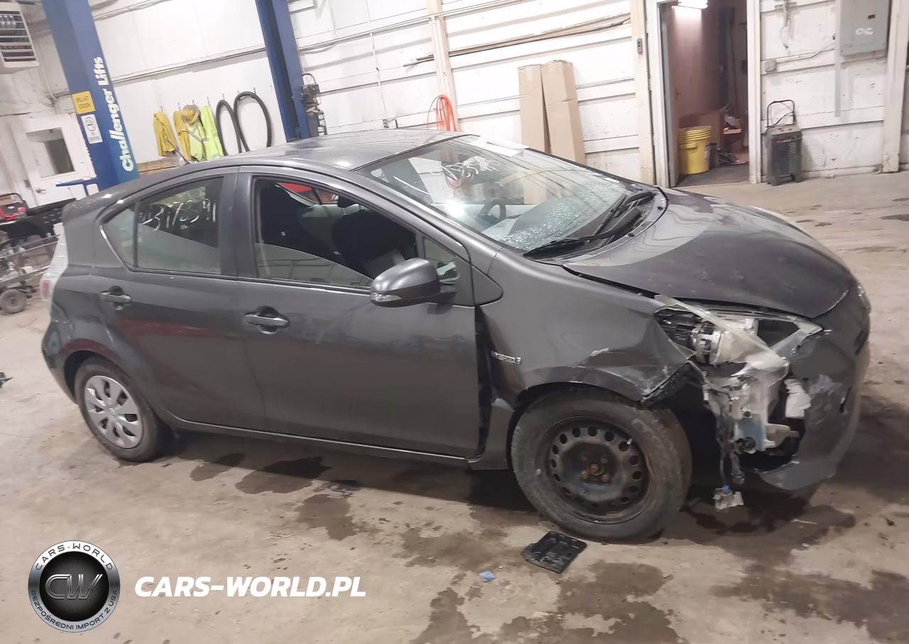 2012 Toyota Prius C Two VIN:JTDKDTB3XC1526219 - 13