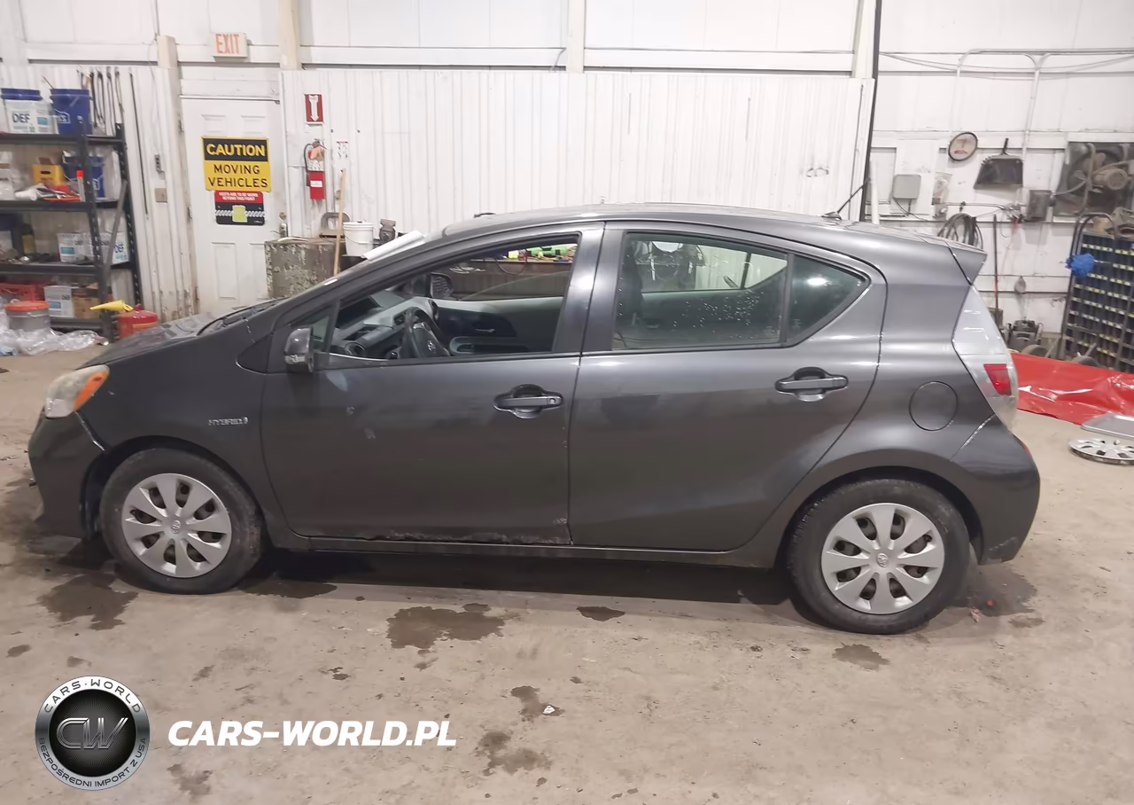 2012 Toyota Prius C Two VIN:JTDKDTB3XC1526219 - 14