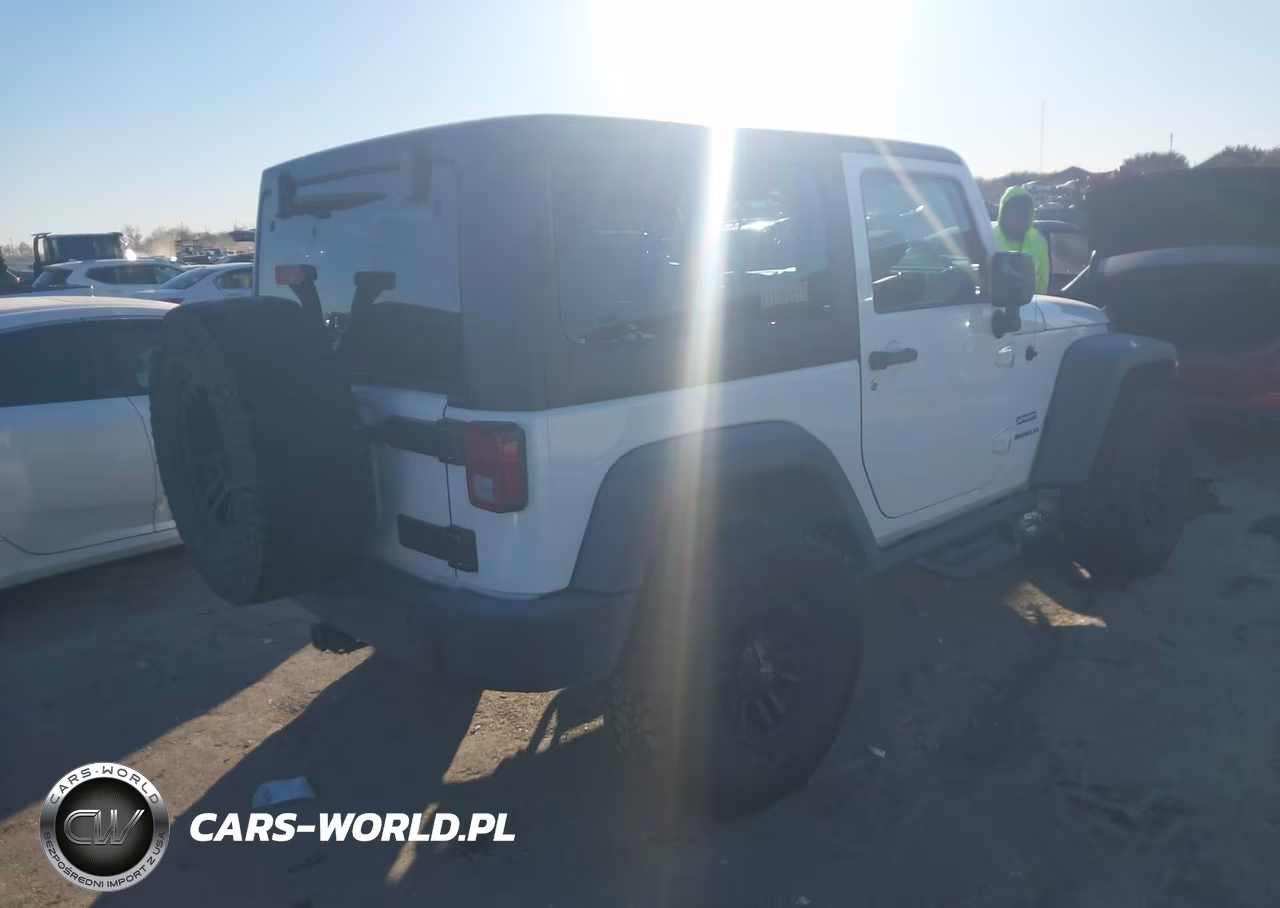 2015 Jeep Wrangler Sport VIN:1C4AJWAG4FL649579 - 4