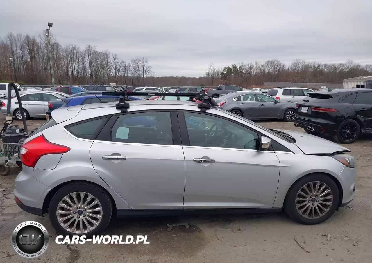 2012 Ford Focus Titanium VIN:1FAHP3N26CL308955 - 13