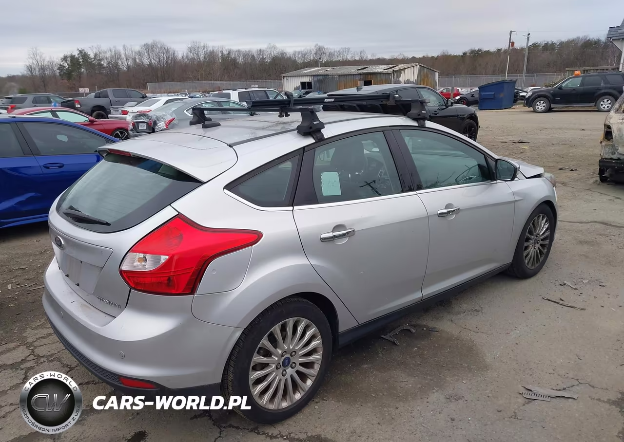 2012 Ford Focus Titanium VIN:1FAHP3N26CL308955 - 4