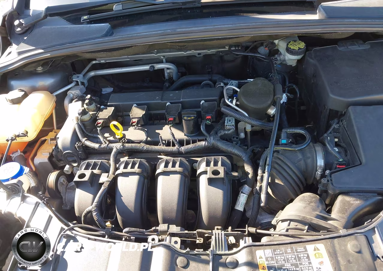 2014 Ford Focus Titanium VIN:1FADP3J25EL395772 - 10